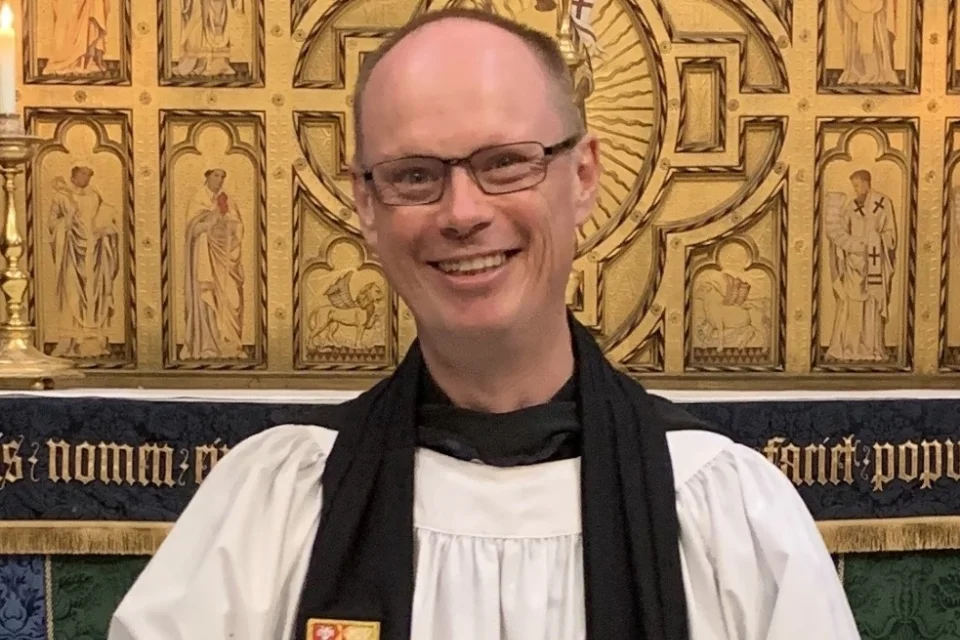 portrait image of reverend in official dress