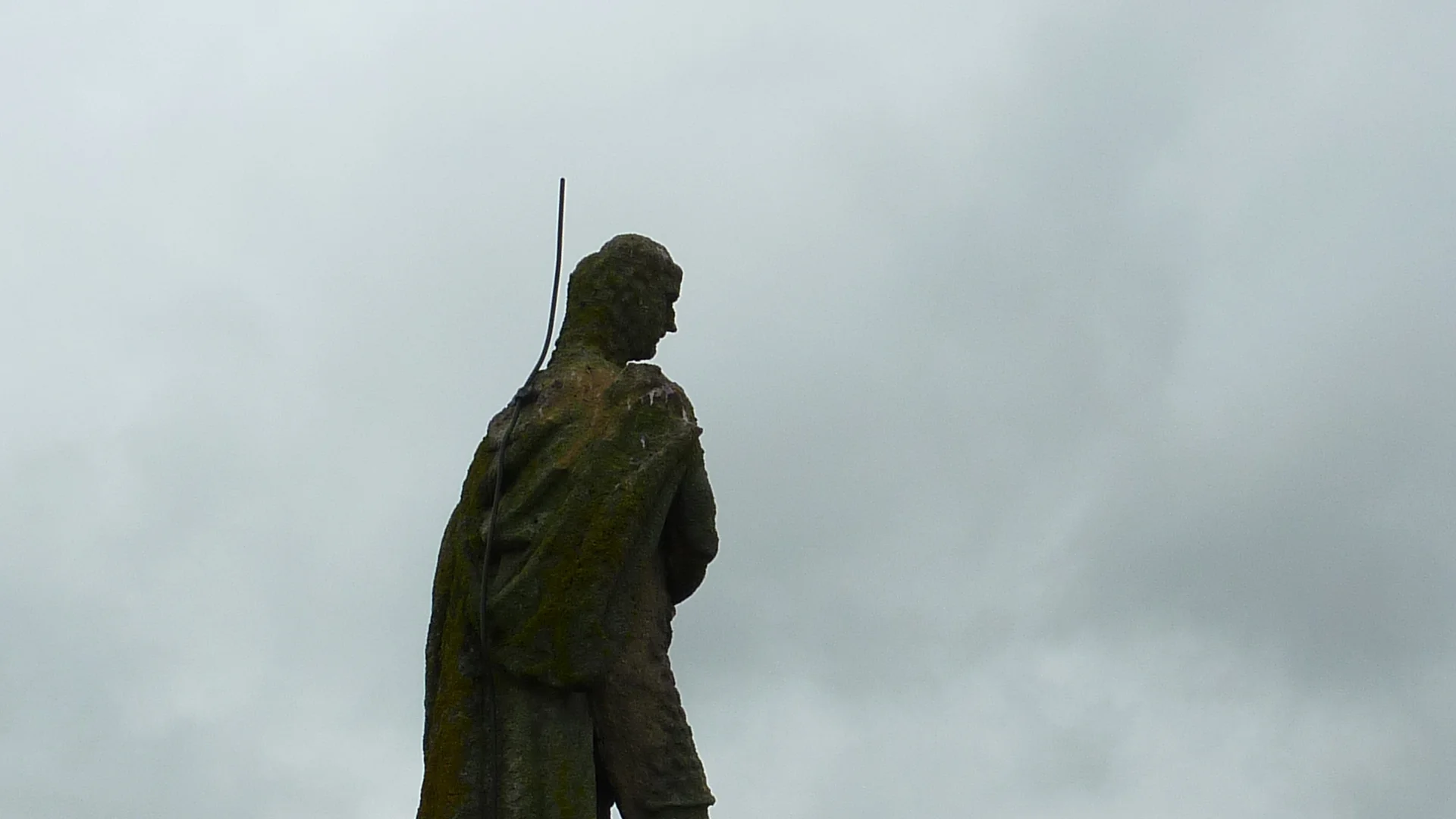 Statue of King on church tower