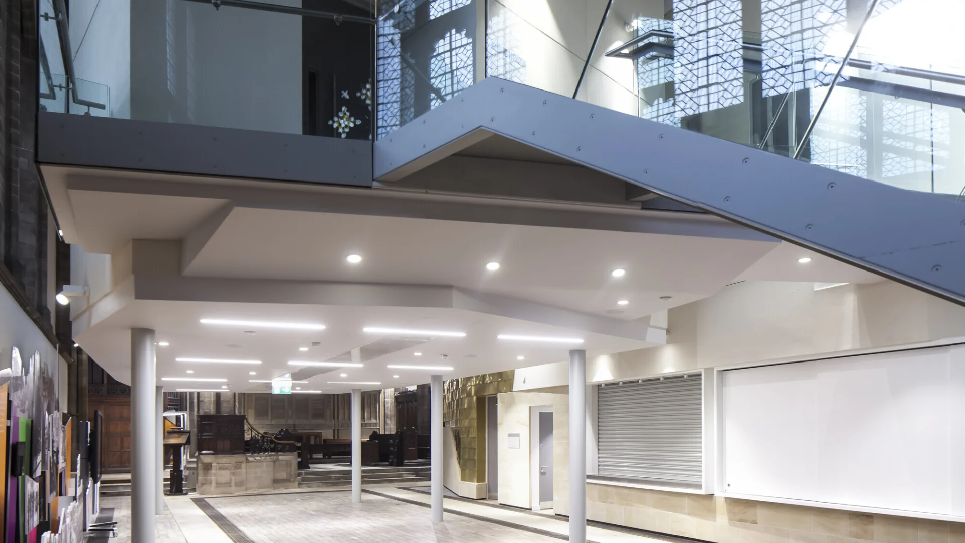 Open modern space with stairs to the right glass