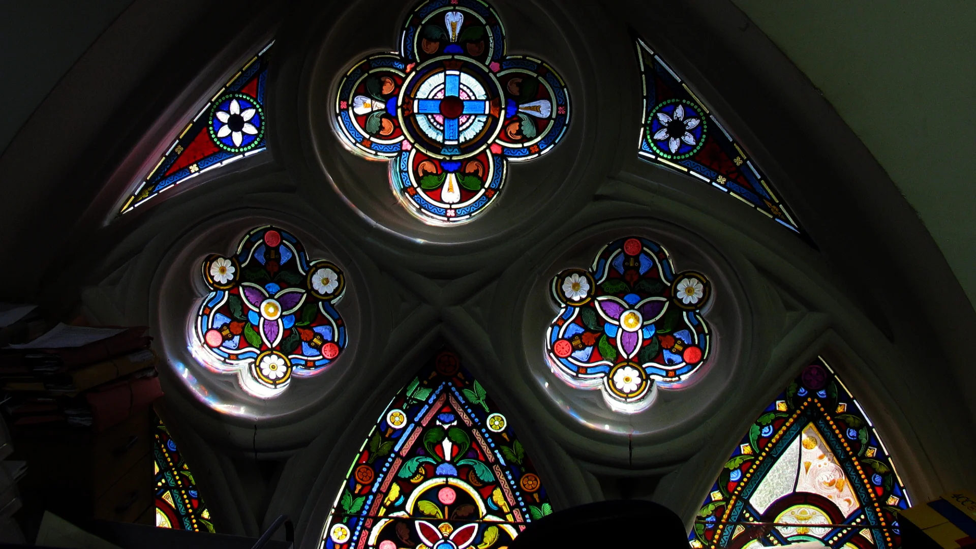Stained glass window in decoratively shaped stonework