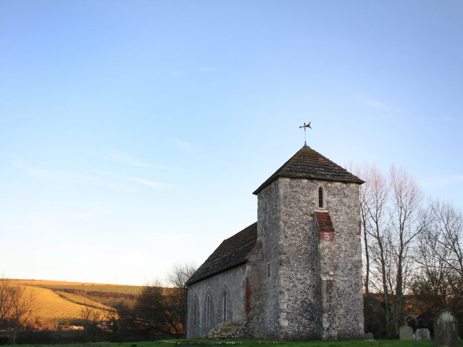 Flint constructed church stands on a slight rise above the River Adur
