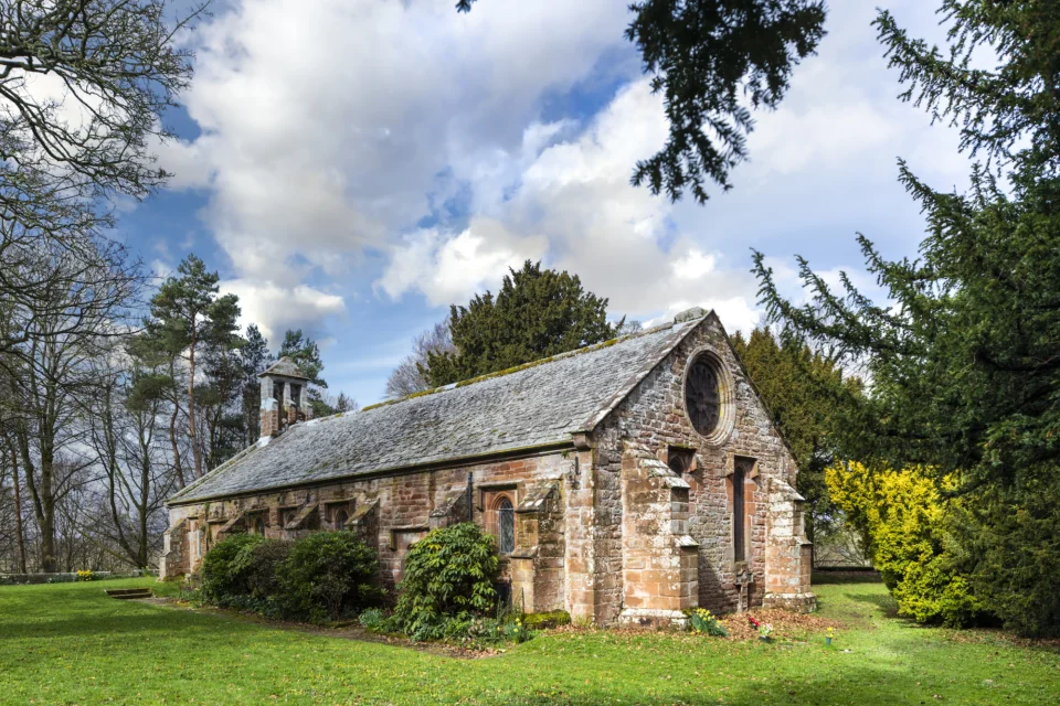 Full Exterior Shot of Church with large round window clear