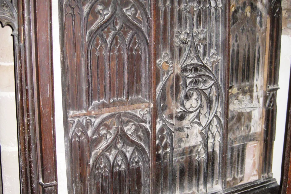 Intricately Carved Dark Woodwork Gate