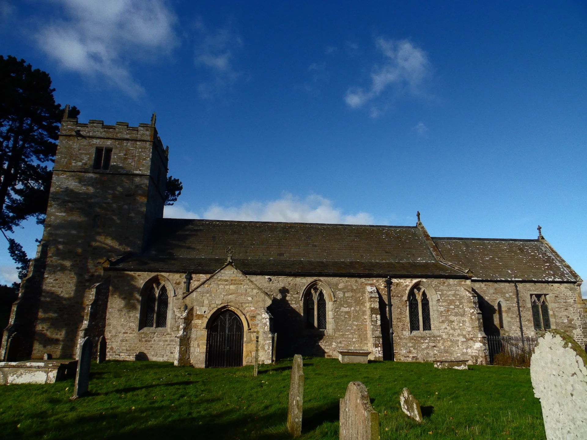 Exterior view, large church originally 13th Century, with 16th Century tower