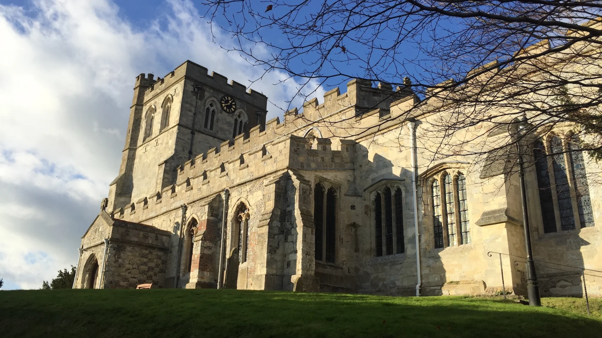 14th-century limestone church with large tower