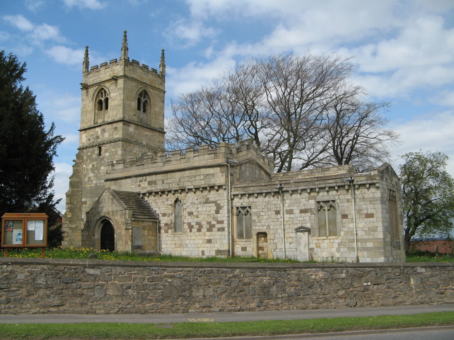 Exterior built from locally quarried magnesian limestone. Chancel, nave and lower part of the west tower from the 12th century and the belfry stage of the tower and majority of the windows Perpendicular style