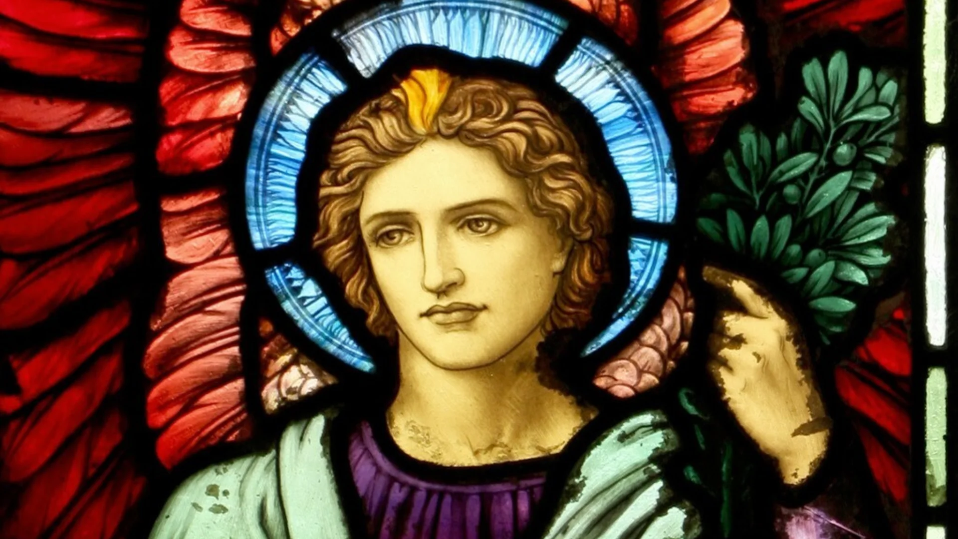 Part of the stained glass window depicting a sacred human figure