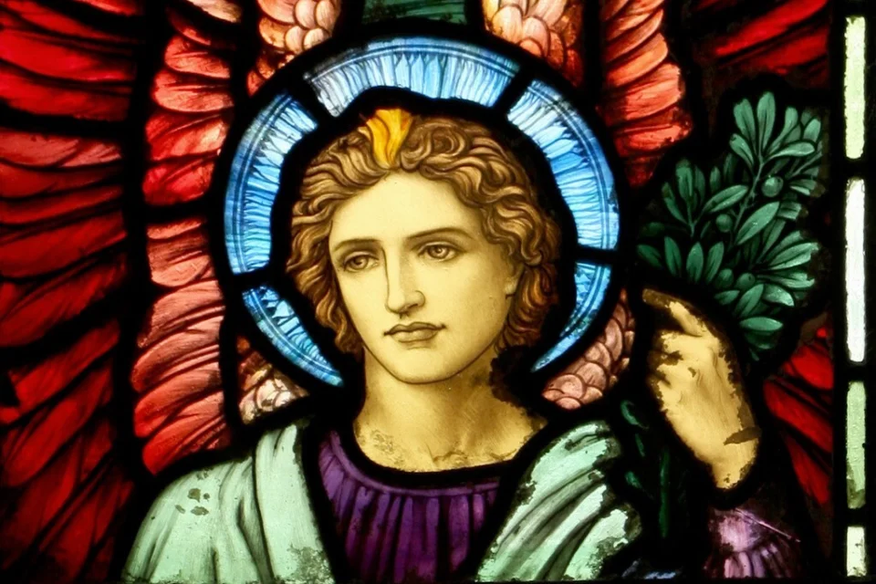 Part of the stained glass window depicting a sacred human figure