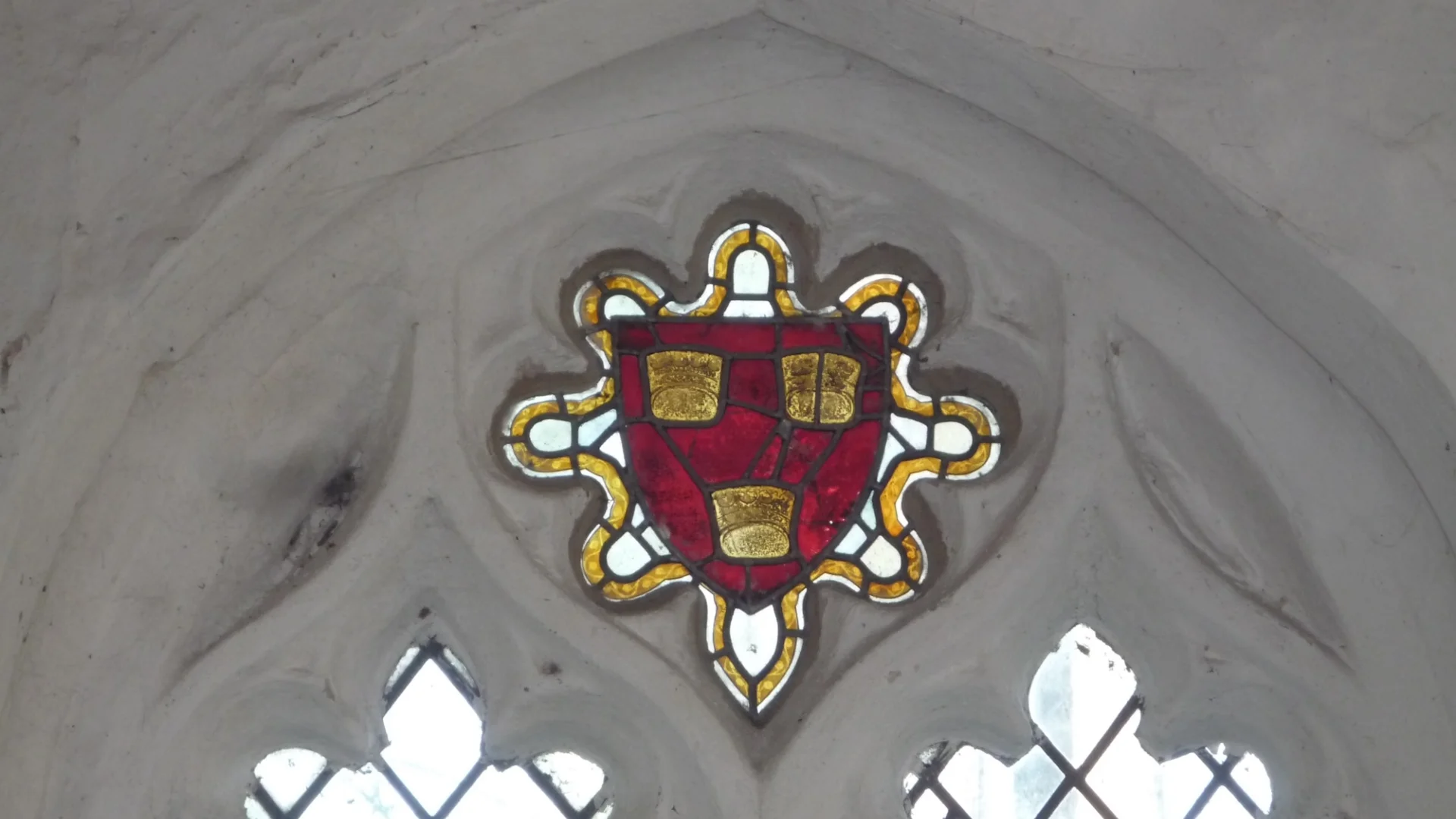 Late Medieval glass (re-set). The Three Crowns of St Etheldreda/The See of Ely.