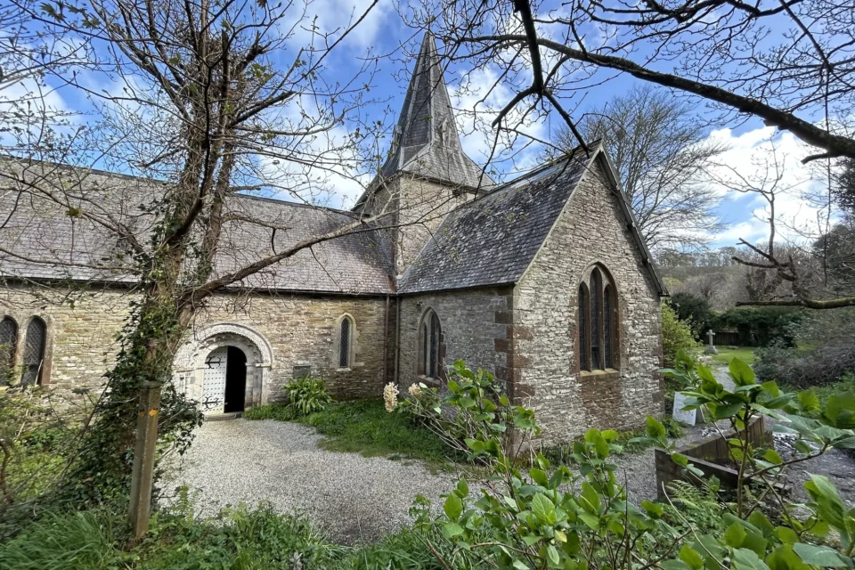 church exterior pointed, short spire and wide nave