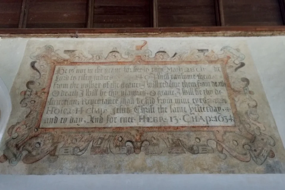 wall paintings with long text not readable through the image, the border is yellow and blue