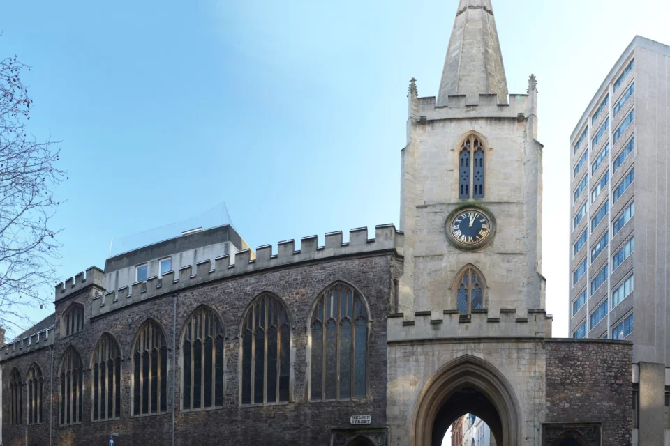 St John's with its perpendicular spire built into the city walls.