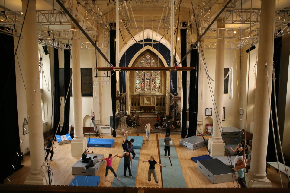 Images of circus performers and art aerial and trapeze equipment