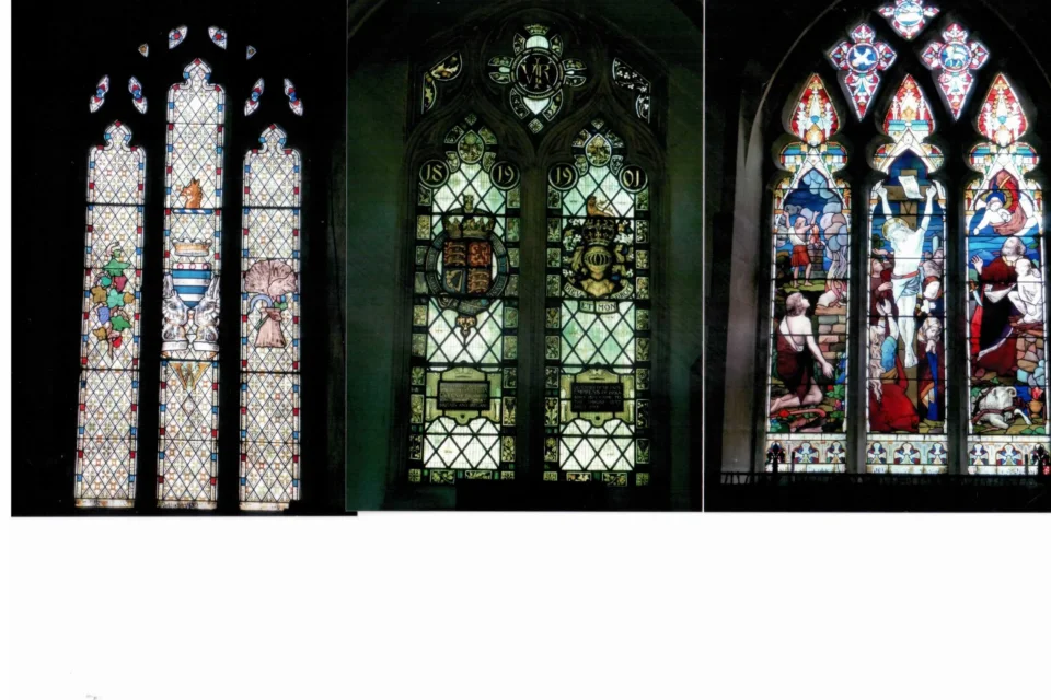 Three large stained windows in the same picture with a variety of themes