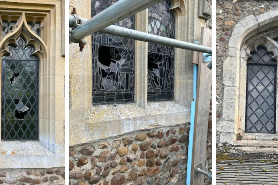 damage shown to clear glass window, with large holes, and one supported with scafolding