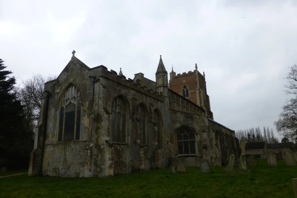 long nave, with redbrick perpendicular tower