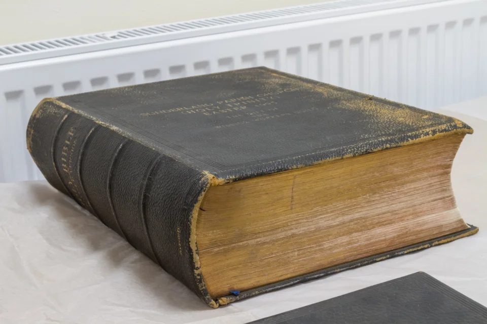 image of large leather bound book
